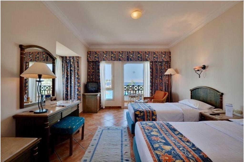 Chambre Triple Classique avec Vue sur Jardin