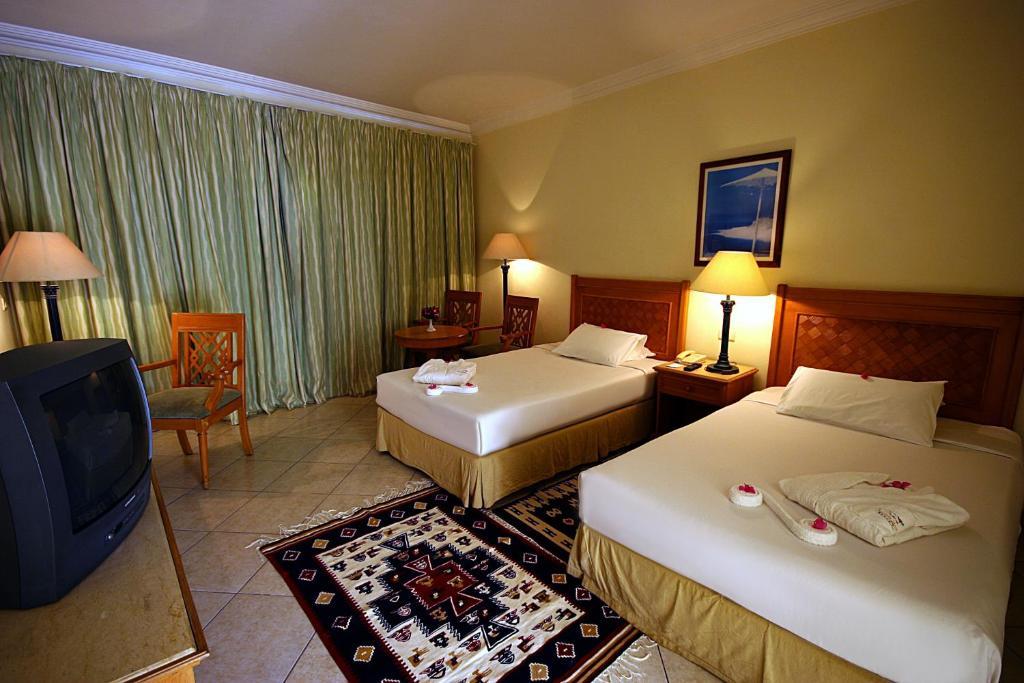 Deluxe Double or Twin Room Pool View,74039543:JPEG